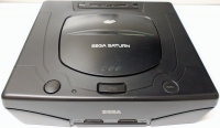 Sega Saturn (Video Game Sampler Enclosed / Includees 3 Free Games) Box Art