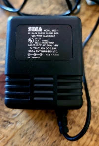 Sega AC Adapter (blue box) Box Art
