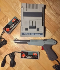 Nintendo MT-999DX (black controllers) Box Art